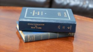 legal books on table at NY law firm